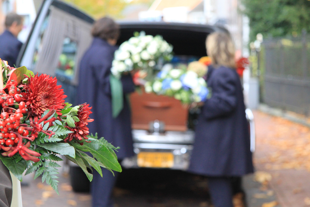 Funeral,Procession,With,Flowers,In,Car