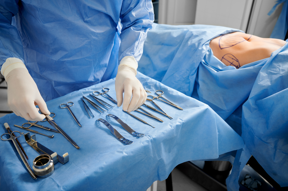 Close,Up,Of,Surgeon,In,Sterile,Gloves,Getting,Ready,Medical