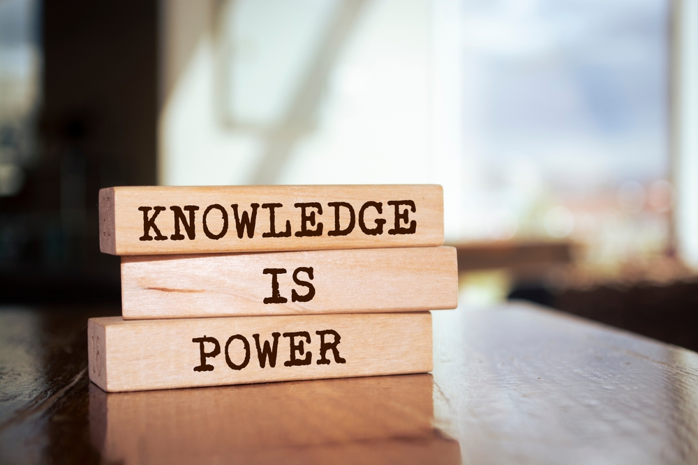 Wooden Blocks Stacked On A Table With The Phrase 'Knowledge Is Power' Printed On Them, Symbolizing The Importance Of U