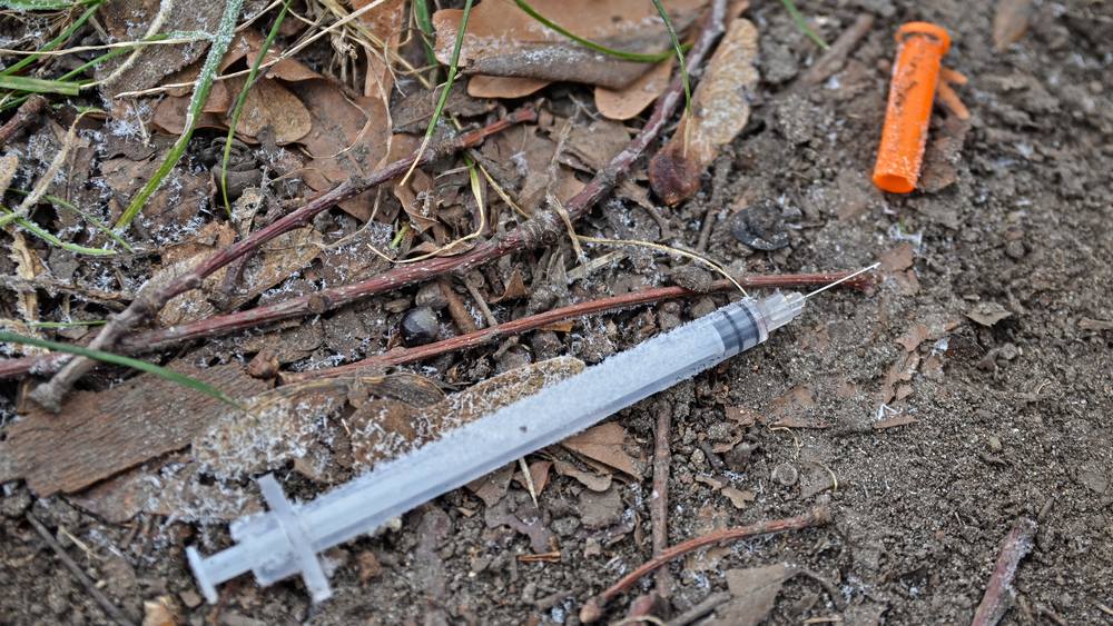 Injection,Syringe,And,Needle,Of,A,Drug,User,On,The